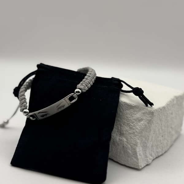 Gray braided bracelet with engraved metal tag — personalized bracelet gift idea for girlfriend