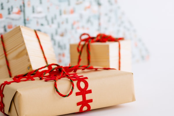 Gift box with red ribbon ready for Father's Day, gift hamper for dad